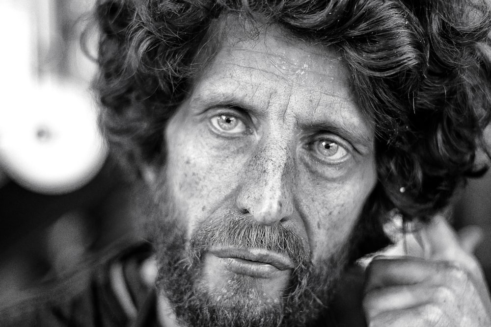 grayscale photography of man's portrait