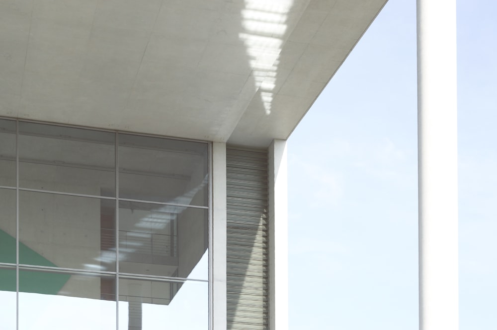 The interior and exterior architecture of Paul-Löbe-House with glass windows.