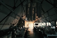 Interior of a contemporary office space with stylish false ceiling and lighting.