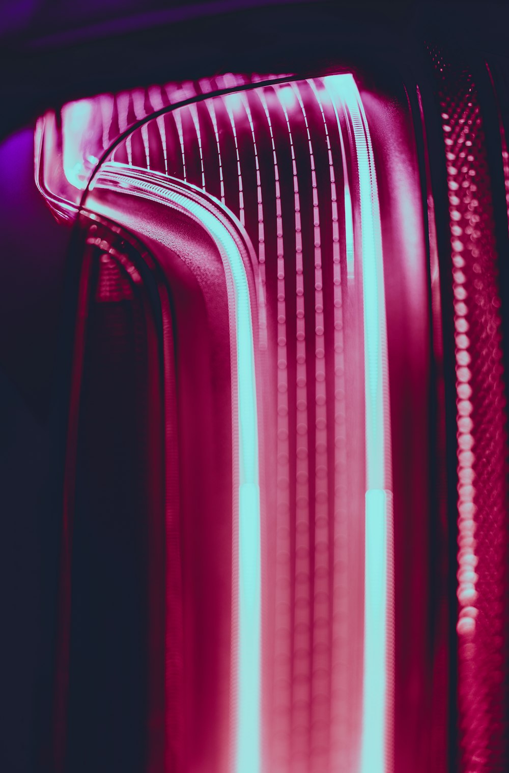 Close-up of glowing lines in a pink neon