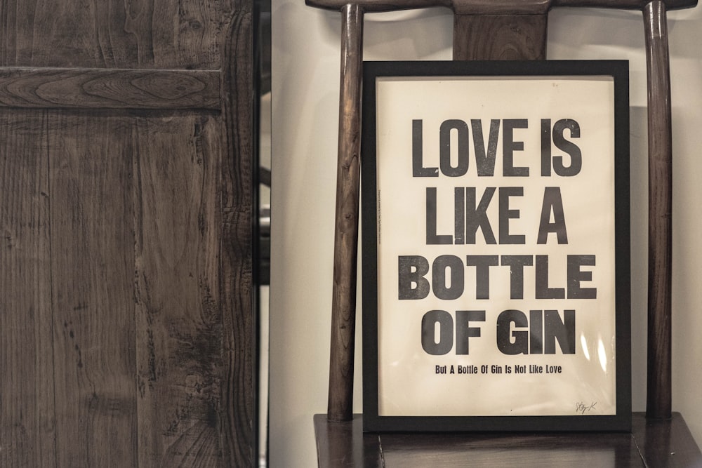 love is like a bottle of gin signage