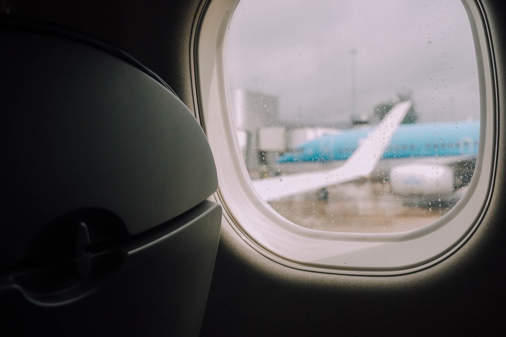 closeup photography of airplane windopw