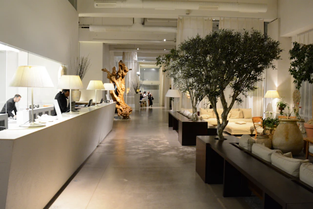 Elegant hotel lobby with modern minimalist design and warm lighting