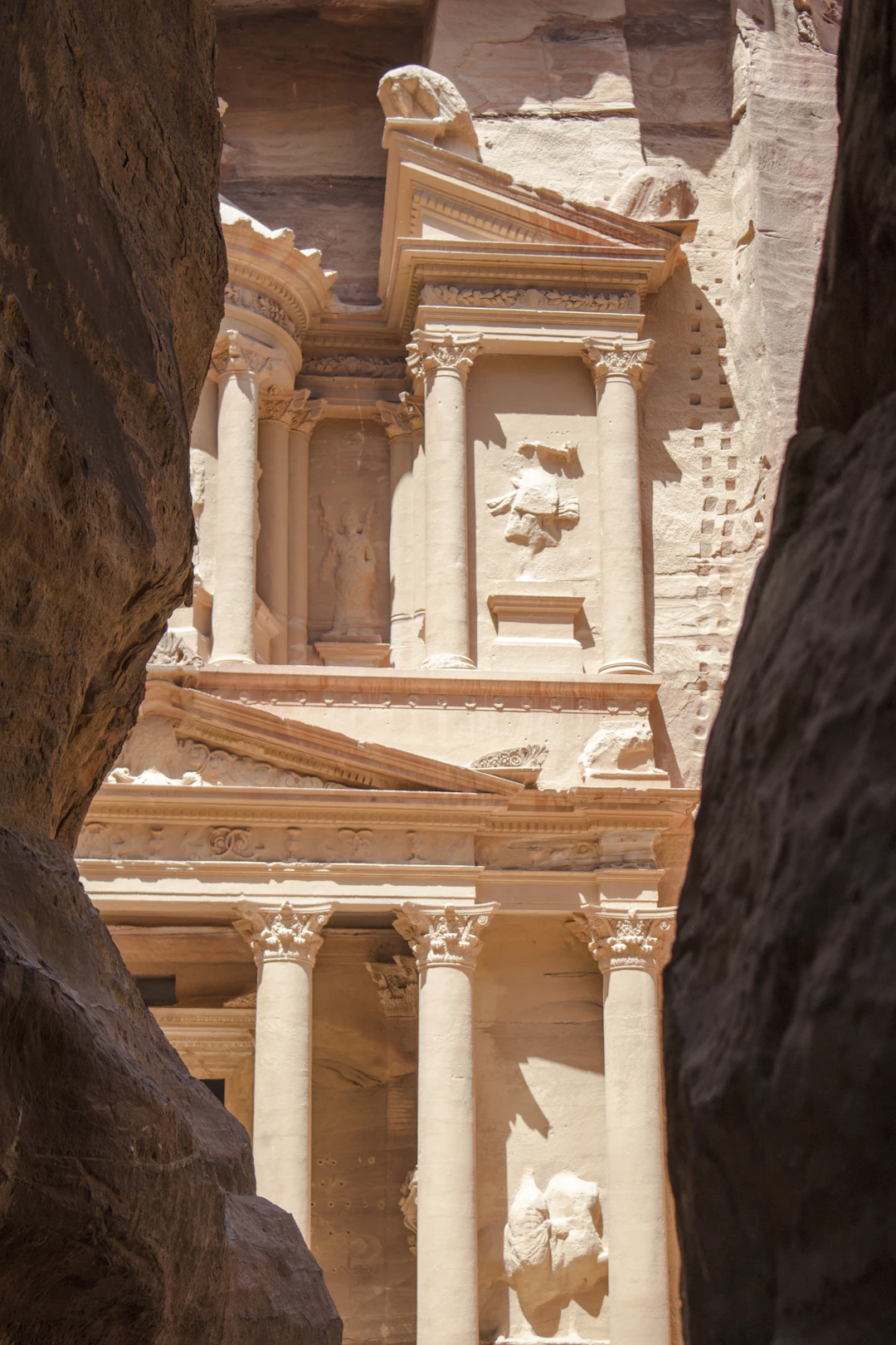 Petra in Jordan seen through rose-coloured stone
