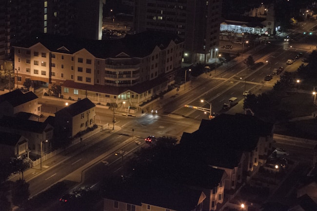 Night view of the well-lit streets and houses in Grand Semanggi Residence.