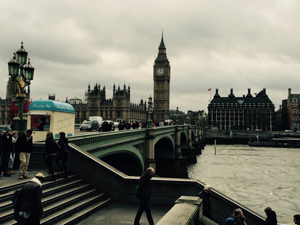 Elizabeth Tower, London view from across the bridge under thick gray clouds photo