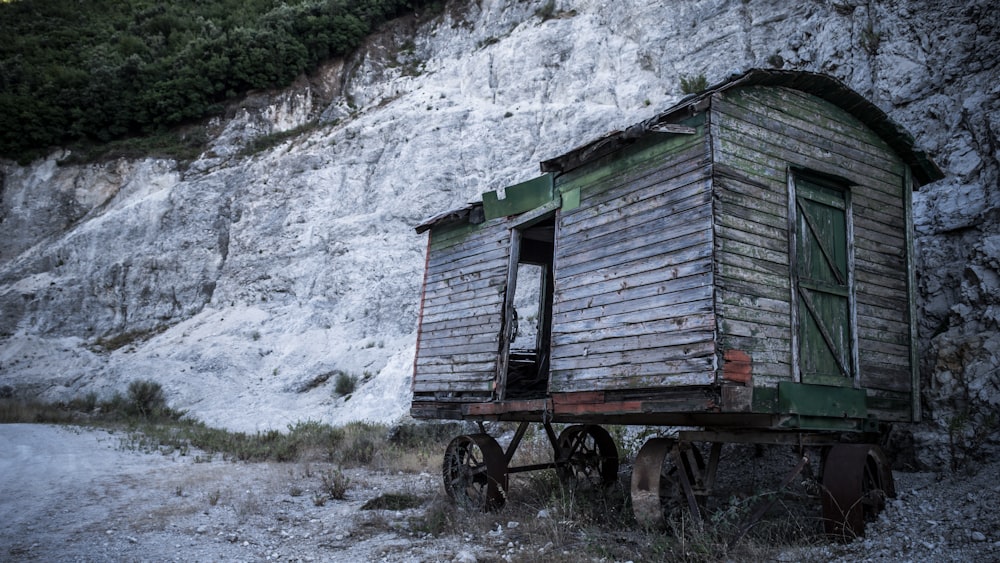 gray wooden house on wheels