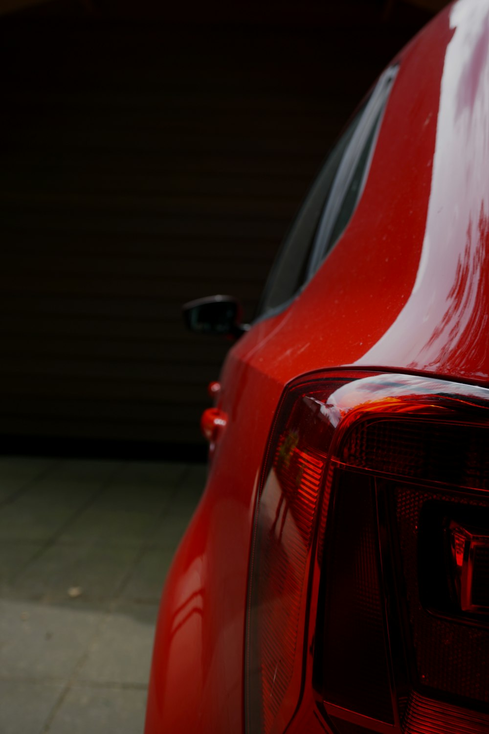 red vehicle park in room