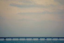 Minimalist design showing a bridge symbolizing connection between mind and spirit