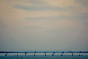 Minimalist design showing a bridge symbolizing connection between mind and spirit