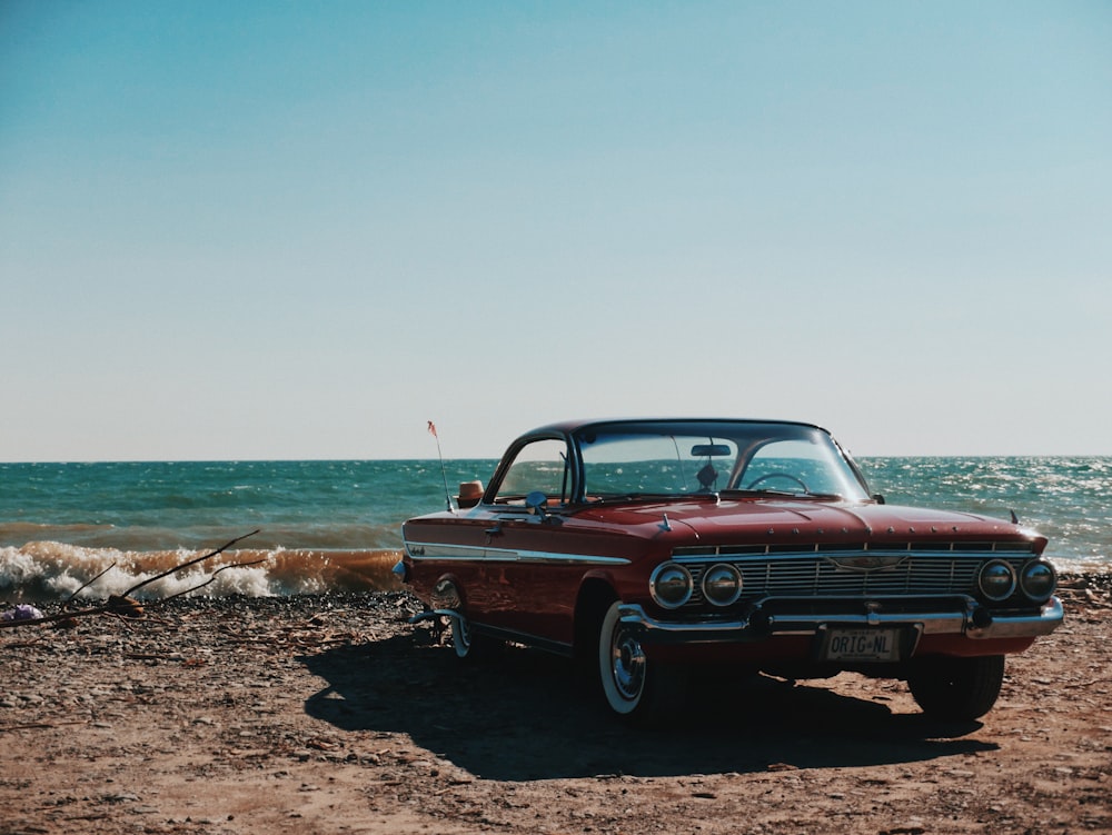 black and grey coupe parked near seashore during daytime