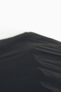 A close-up of a textured surface representing the depth and stillness of kahlwn's design philosophy.