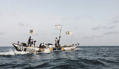 people sailing on boat during daytime ghana zoom background