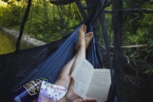 Quiet corner with a hammock and soft cushions, perfect for reading or meditating.