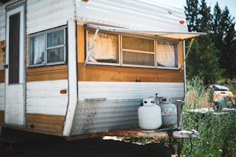 white and gray propane gas tanks on RV trailer