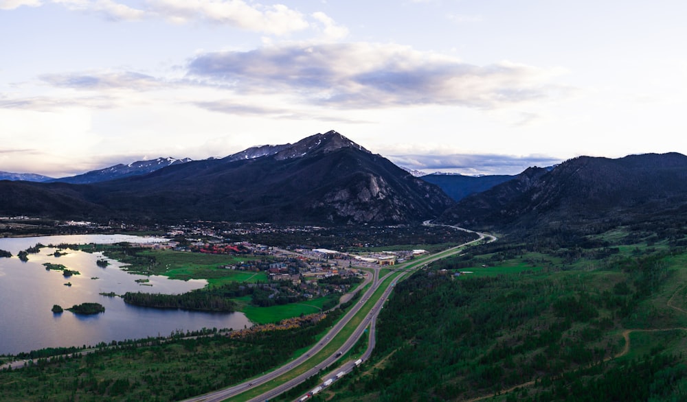 landscape photo of mountains under cloudy sky