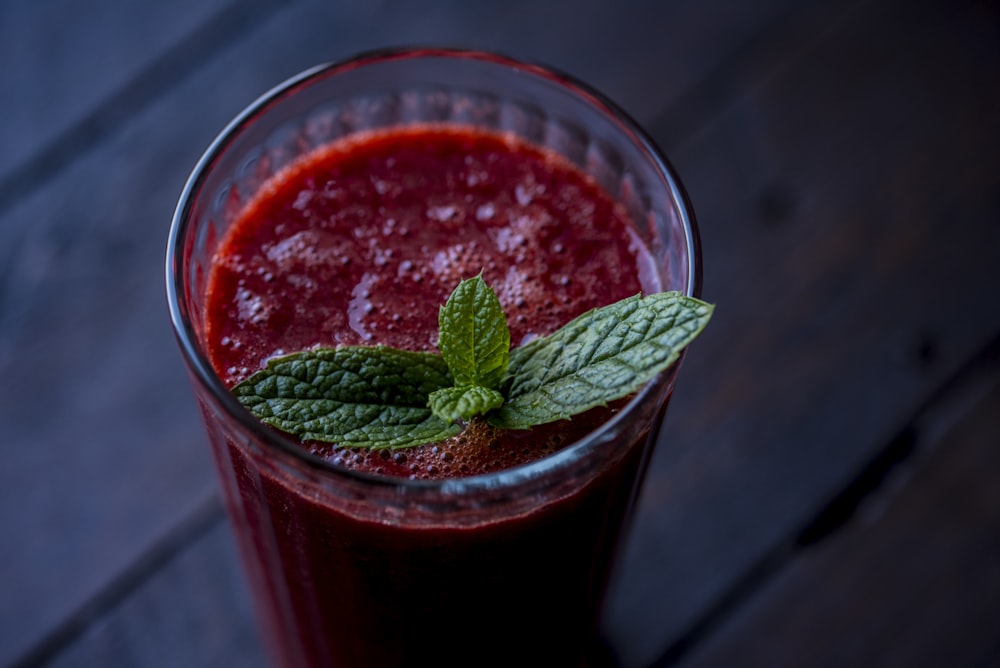 red drink in clear glass