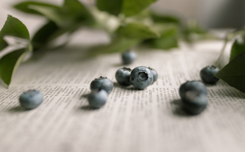 gray stones on brown wooden table