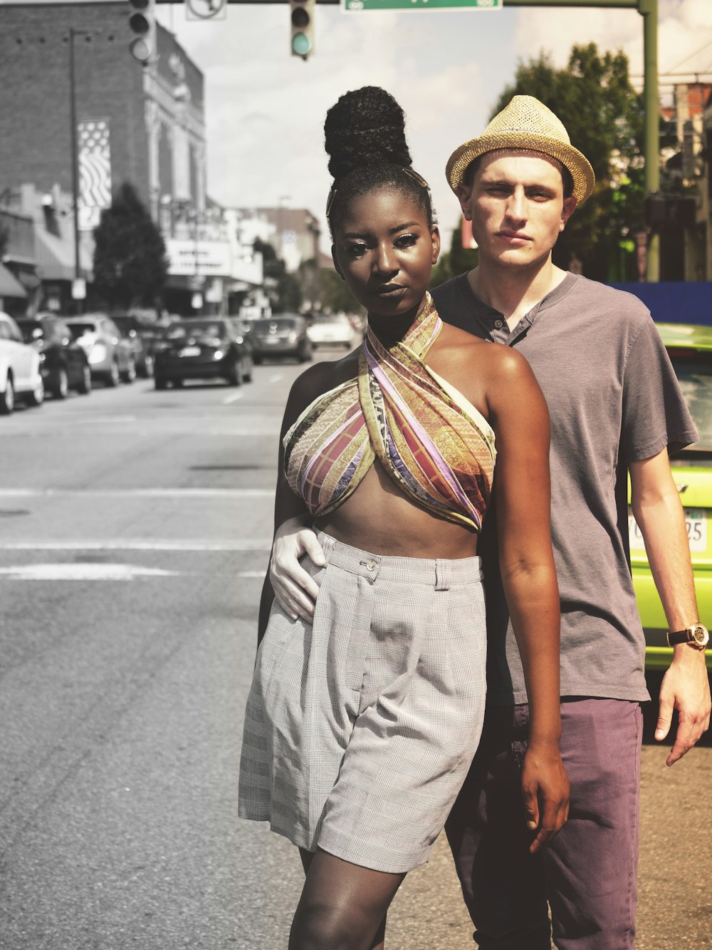An African American woman next to a caucasian man.