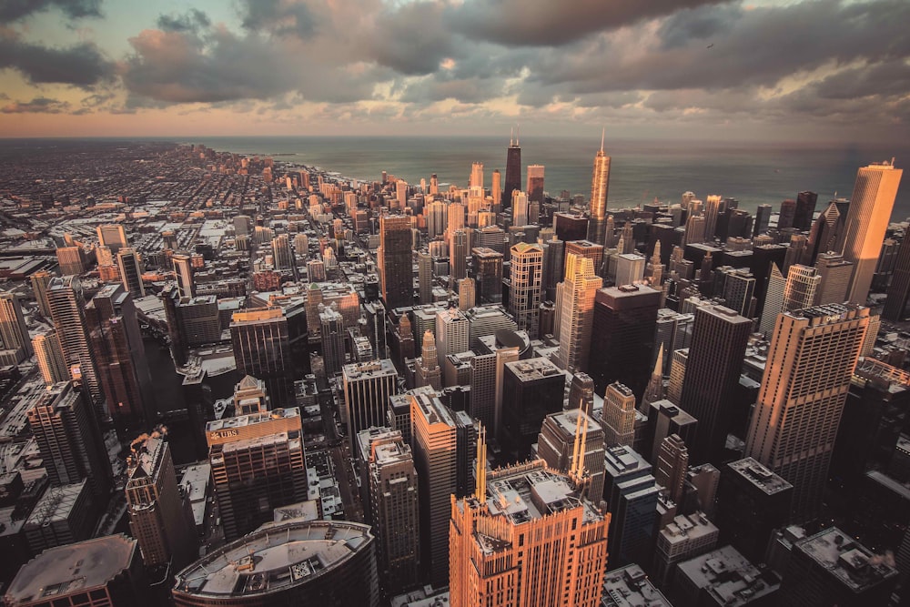 aerial photography of city buildings during cloudy sky