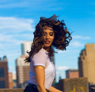 woman wearing white shirt standing