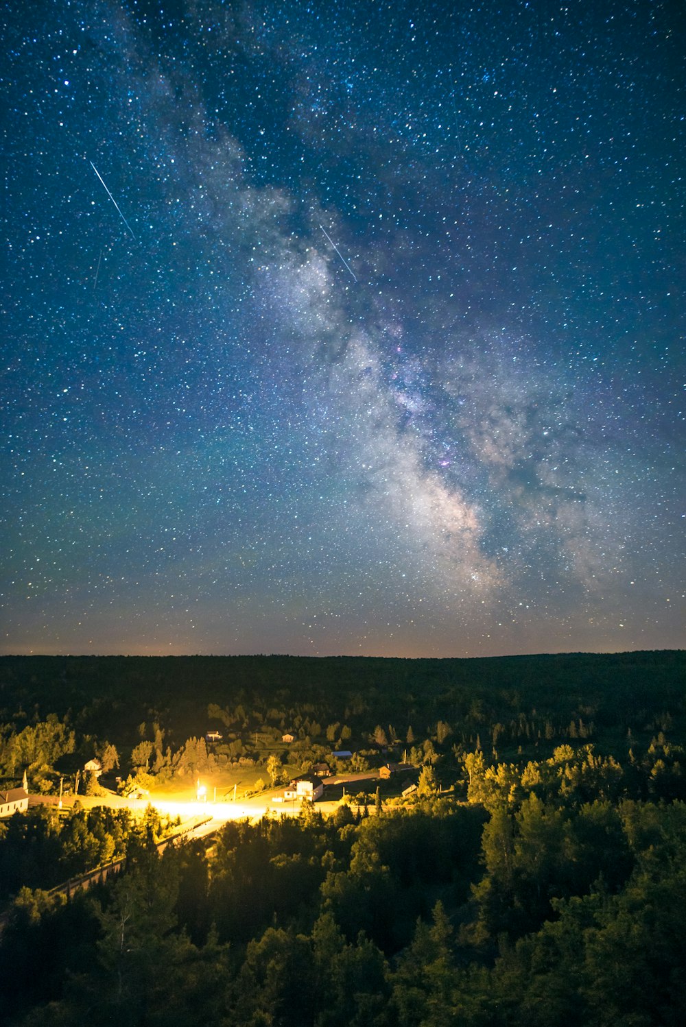 time lapse photography of shooting star passing by