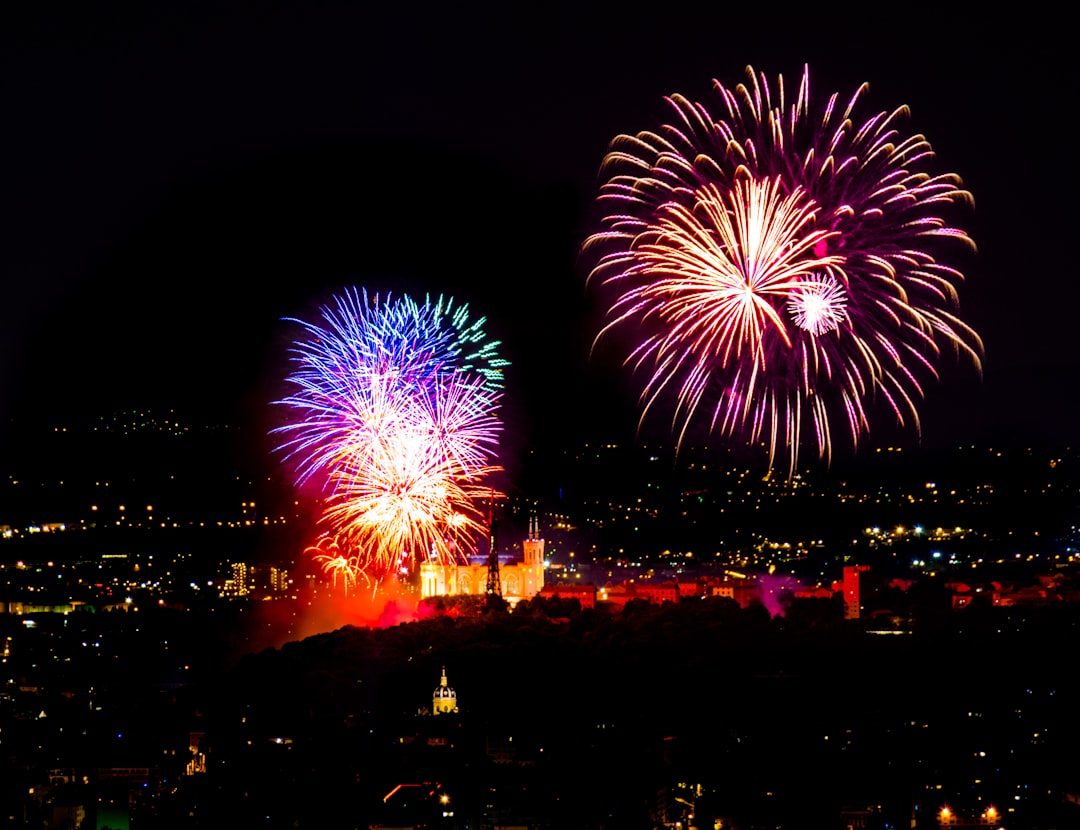 A colorful fireworks display at night in France.