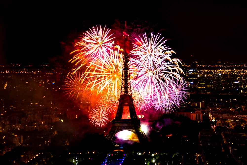 A fireworks display behind the Eiffel Tower in France.