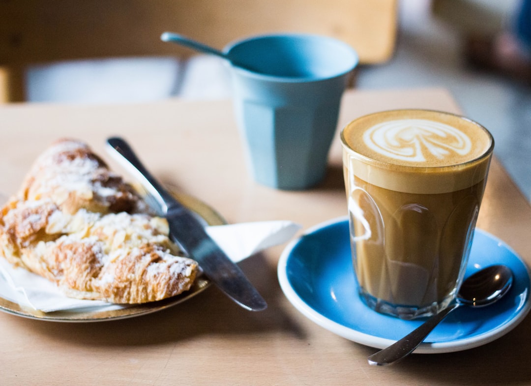 Coffee and pastry breakfast in a cafe.