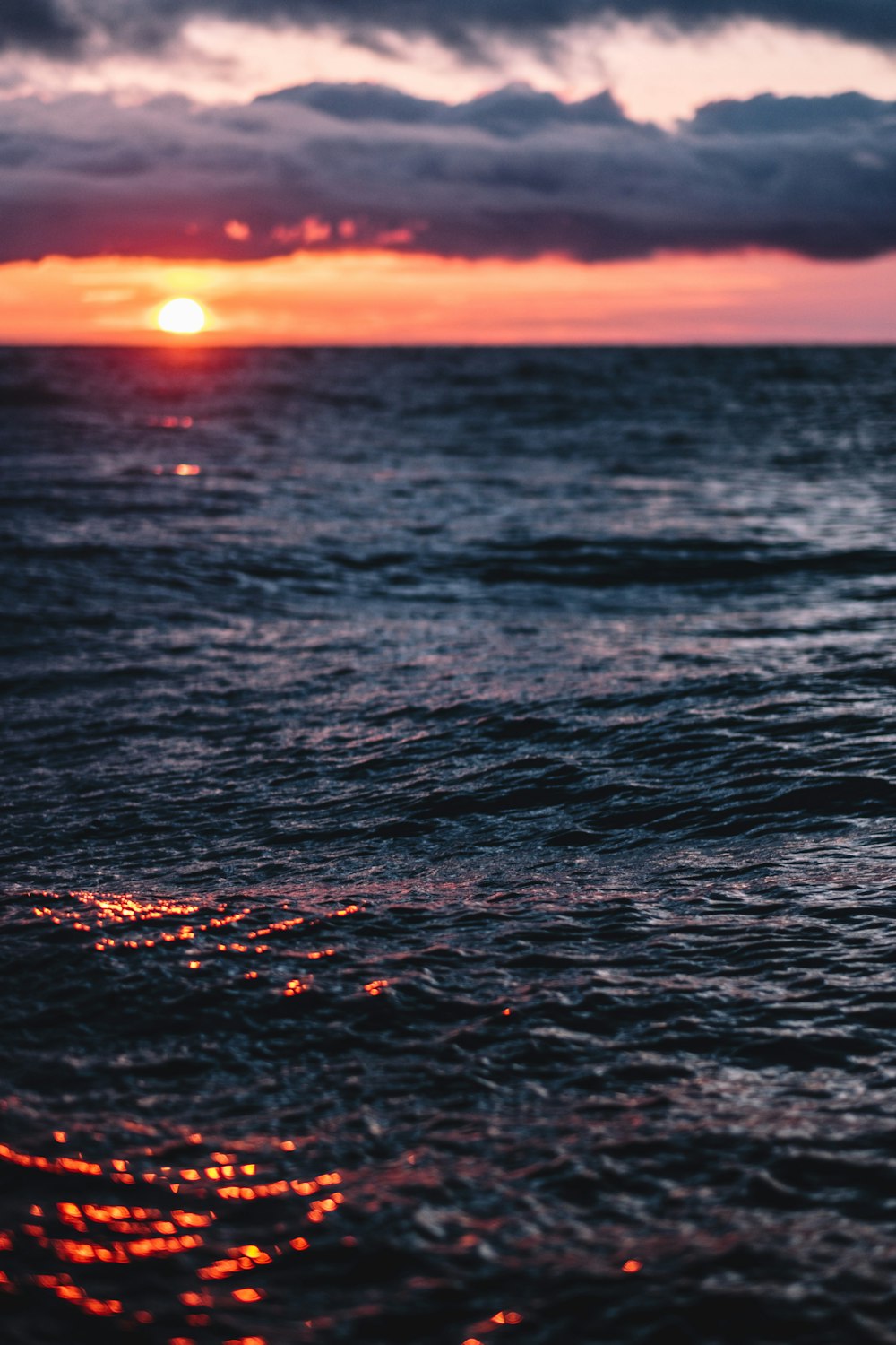 body of water in golden hour background