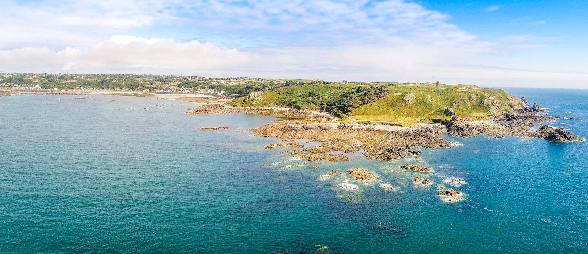 aerial view of land near body of water