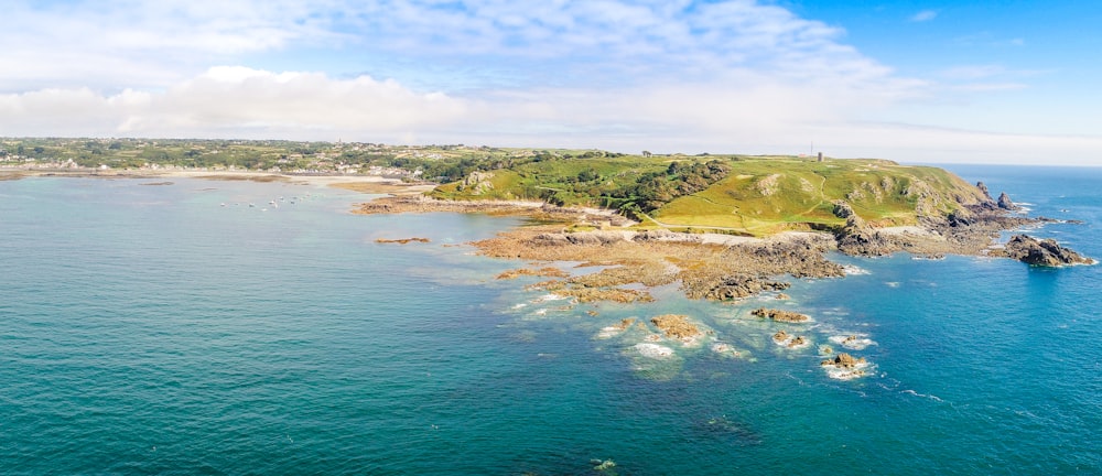 aerial view of land near body of water