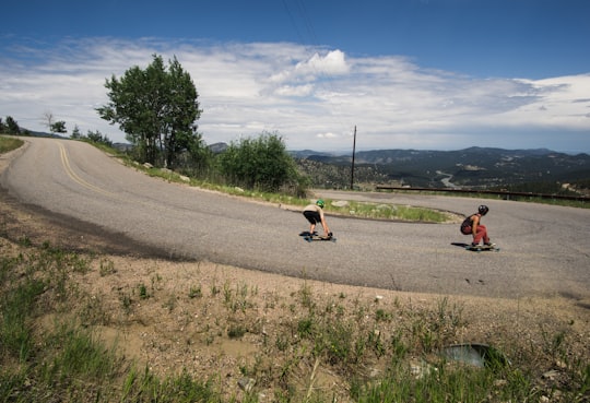 two people on skateboards in Evergreen United States