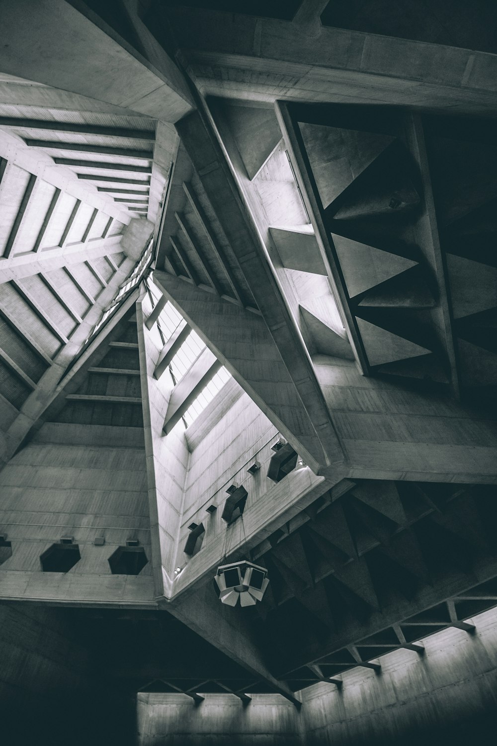 greyscale photo of wood ceiling