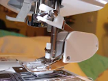 Close-up of a plastic injection molding machine producing technical plastic parts