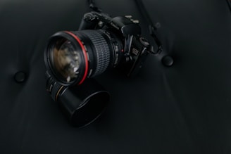 black Canon EOS DSLR camera