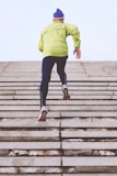 person climbing concrete stairs