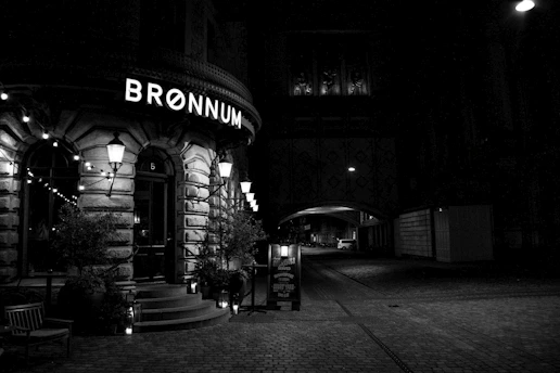 A cozy Copenhagen street with Nordic Adcraft's logo subtly displayed on a shop window.