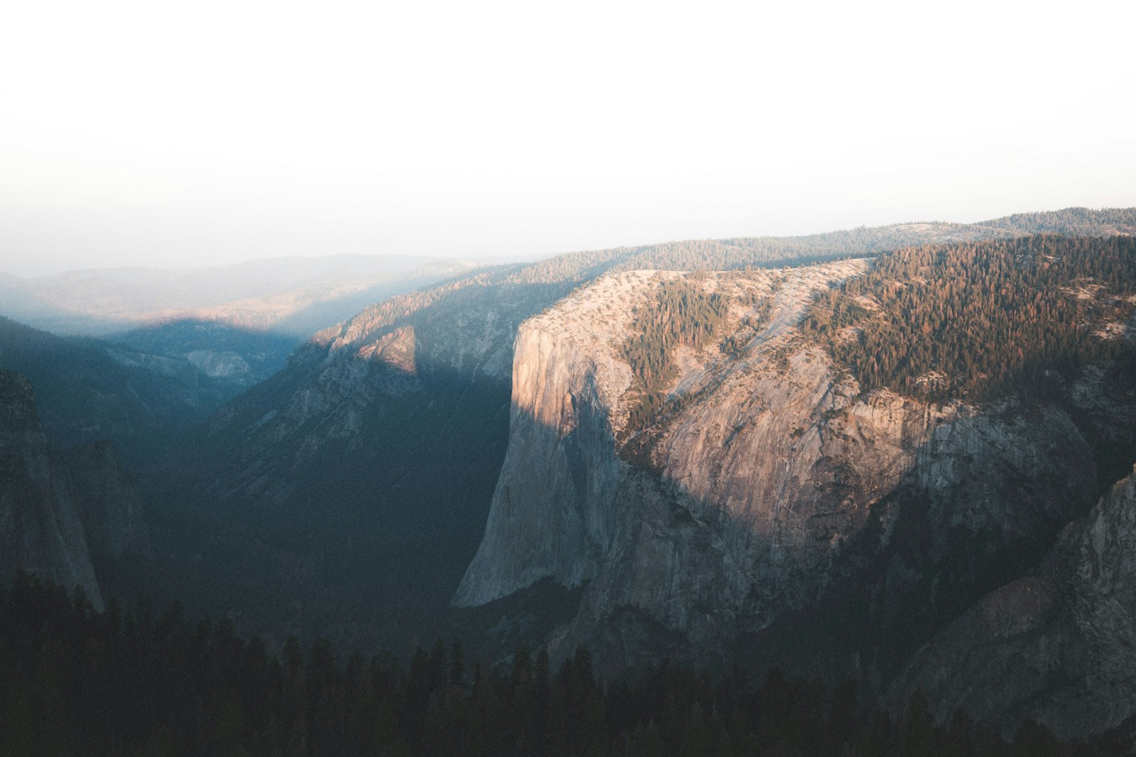 Canon EF-S 24mm F2.8 STM sample photo. Mountain cliff surrounded with photography