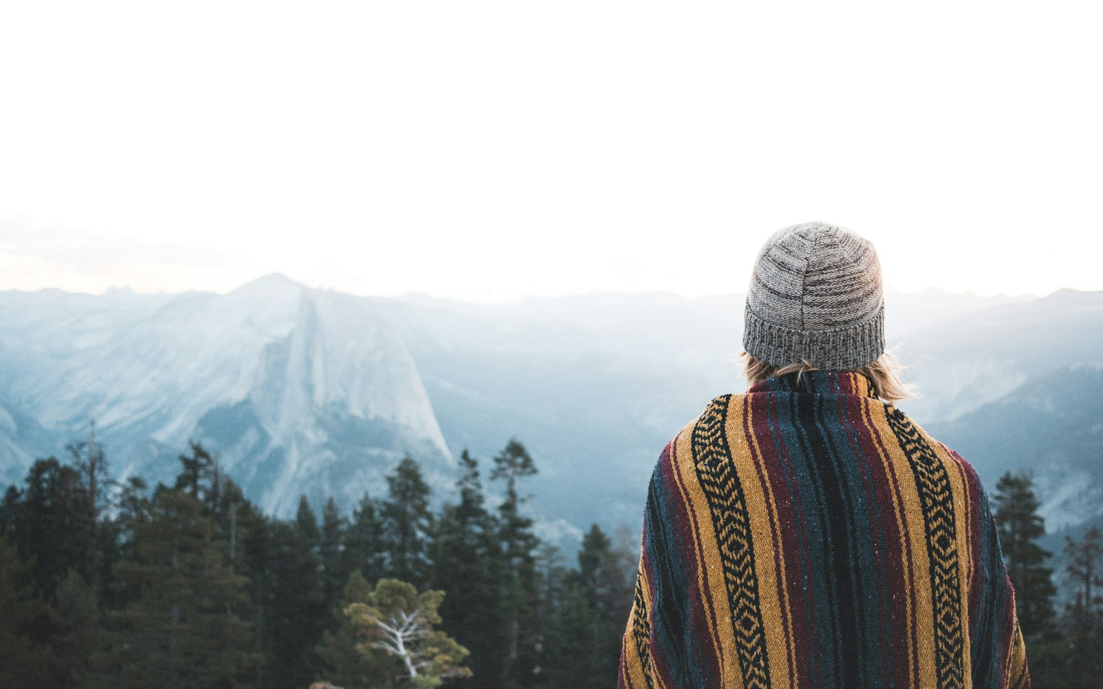 Canon EOS 7D Mark II + Canon EF-S 24mm F2.8 STM sample photo. Woman facing the mountains photography