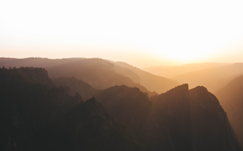 silhouette of mountain during dawn