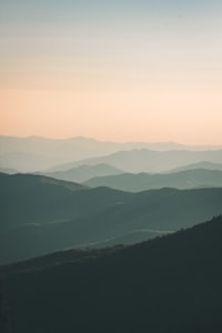 Mountains under a soft morning mist