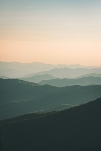 Mountains under a soft morning mist