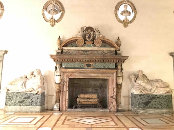 A beautifully crafted fireplace statue displayed in a cozy living room.