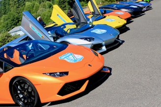 A lineup of various car models ready for engine reprogramming service.