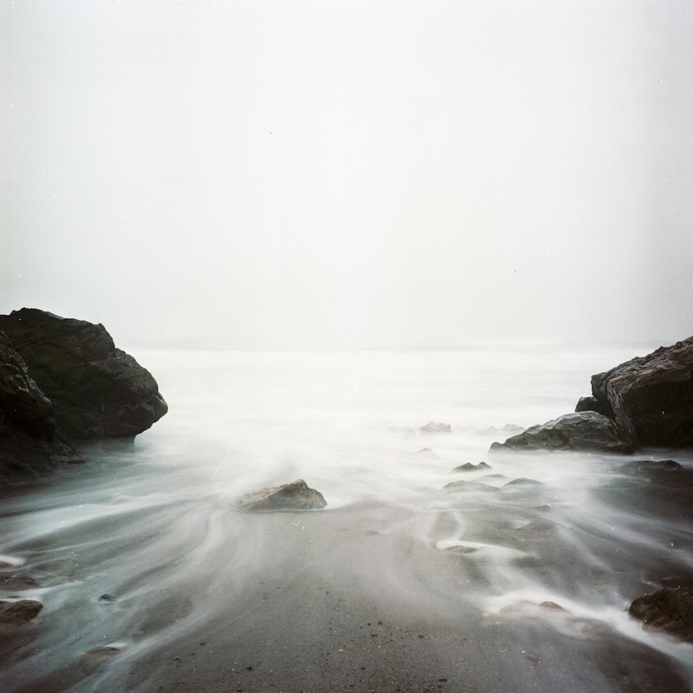 time-lapse photography of flowing body of water