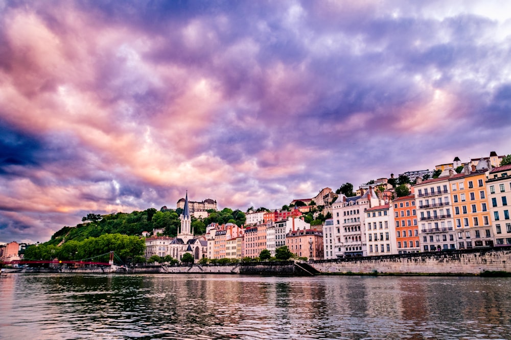 A cityscape view from the water in a France city.