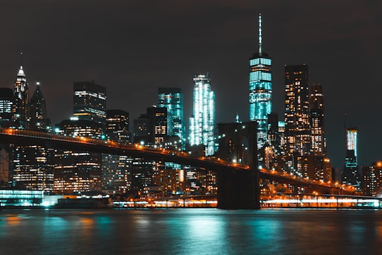 landscape photograph of brooklyn bridge at nighttime in Brooklyn Bridge Park United States