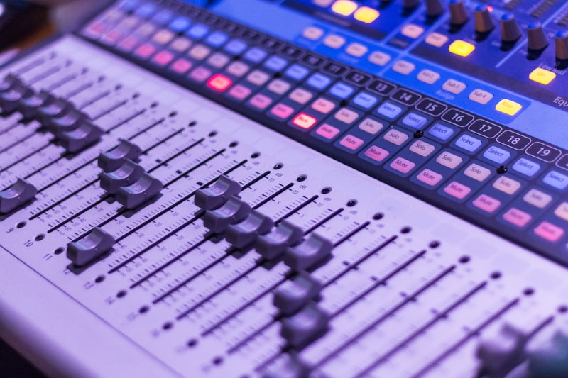 Studio desk with audio controls and workspace tools