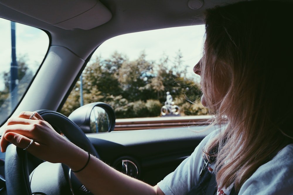 Woman concentrates on the road while driving